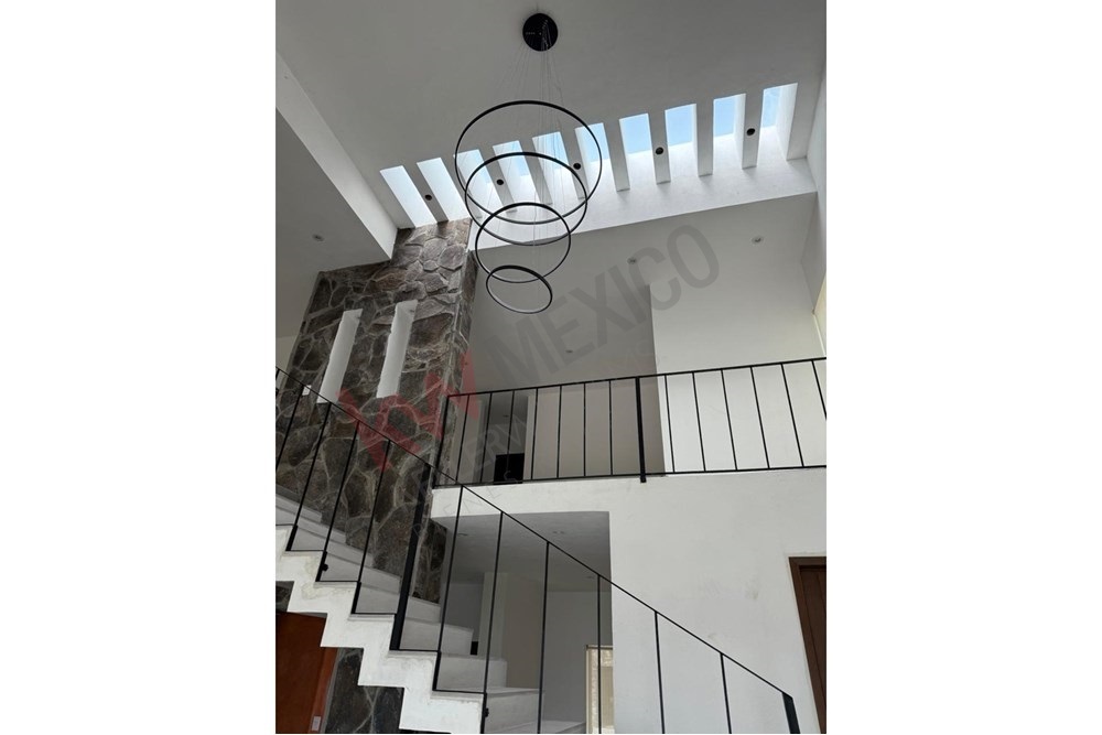 3 of 31: Modern staircase with elegant stone wall design