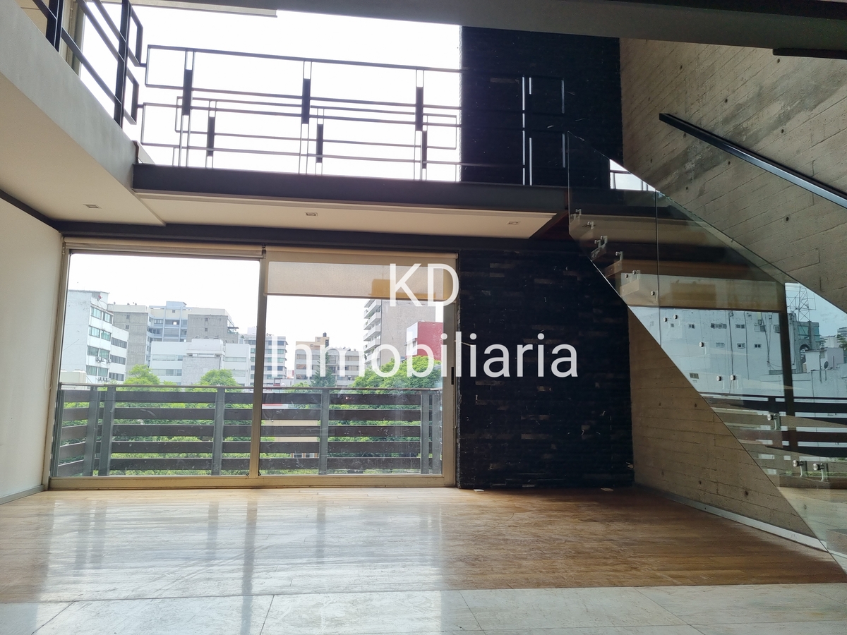 2 de 12: Sala con doble altura