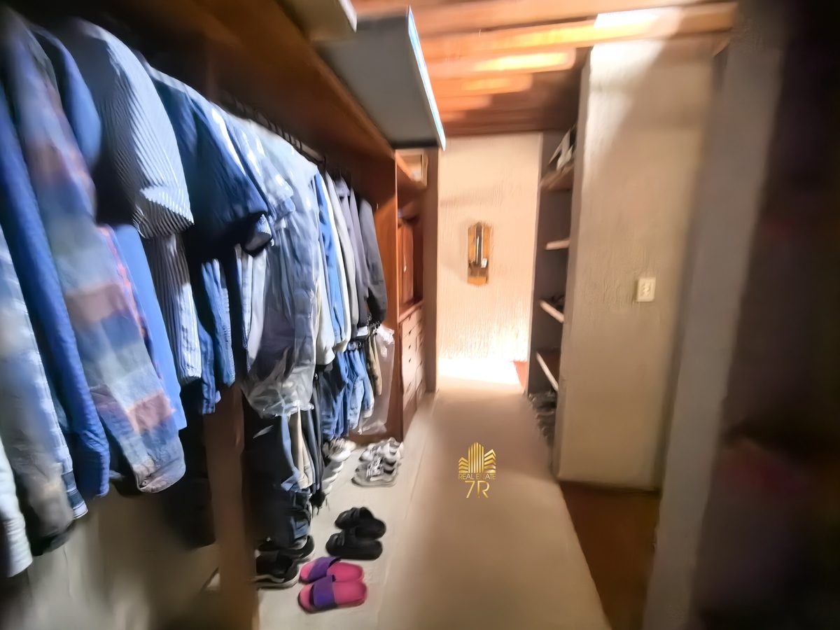 33 de 40: Vestidor de recámara secundaria