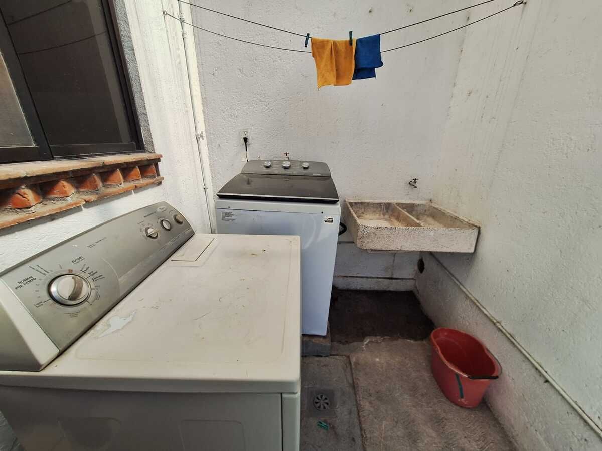 26 of 29: AREA LAVADO TECHADA