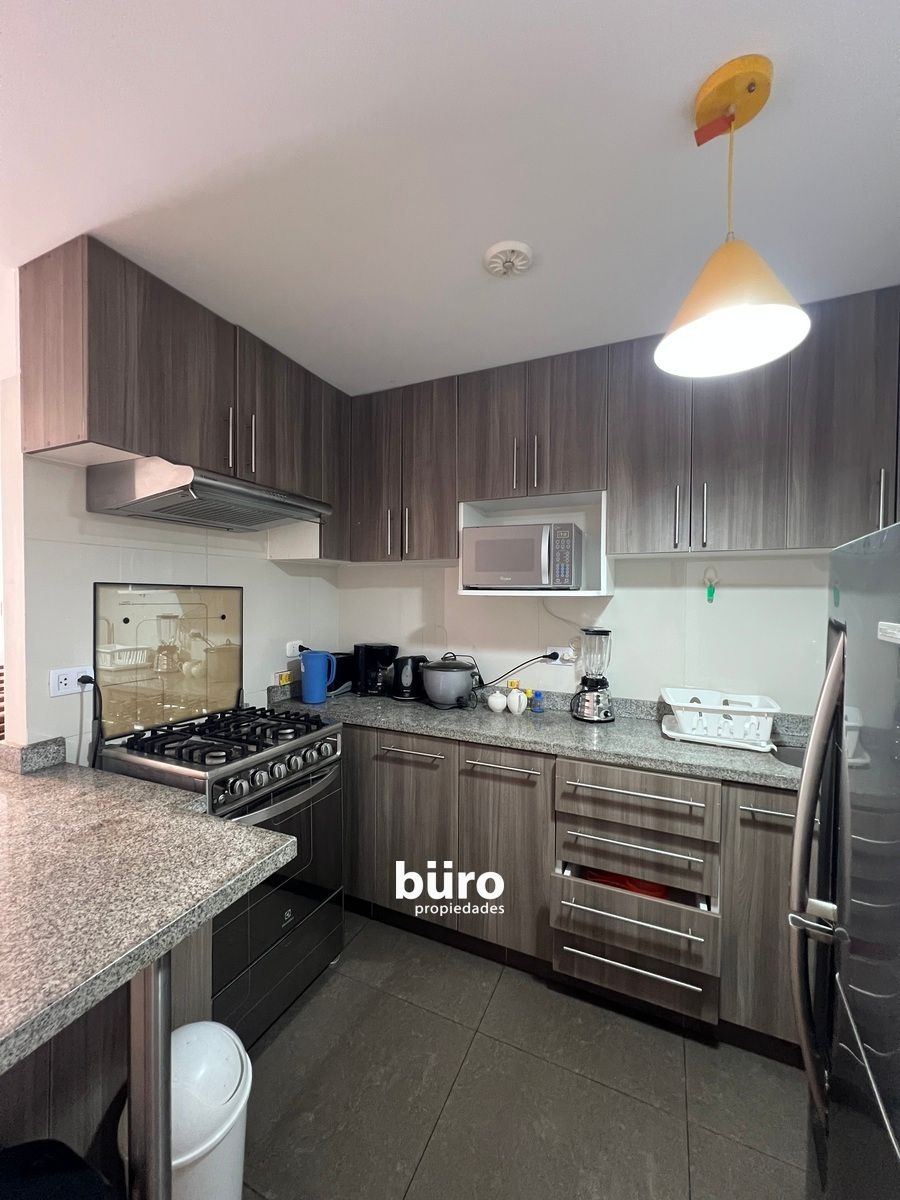 9 de 17: Cocina integrada full equipada