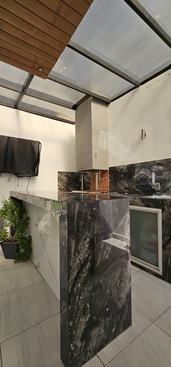 18 de 18: Asador en terraza