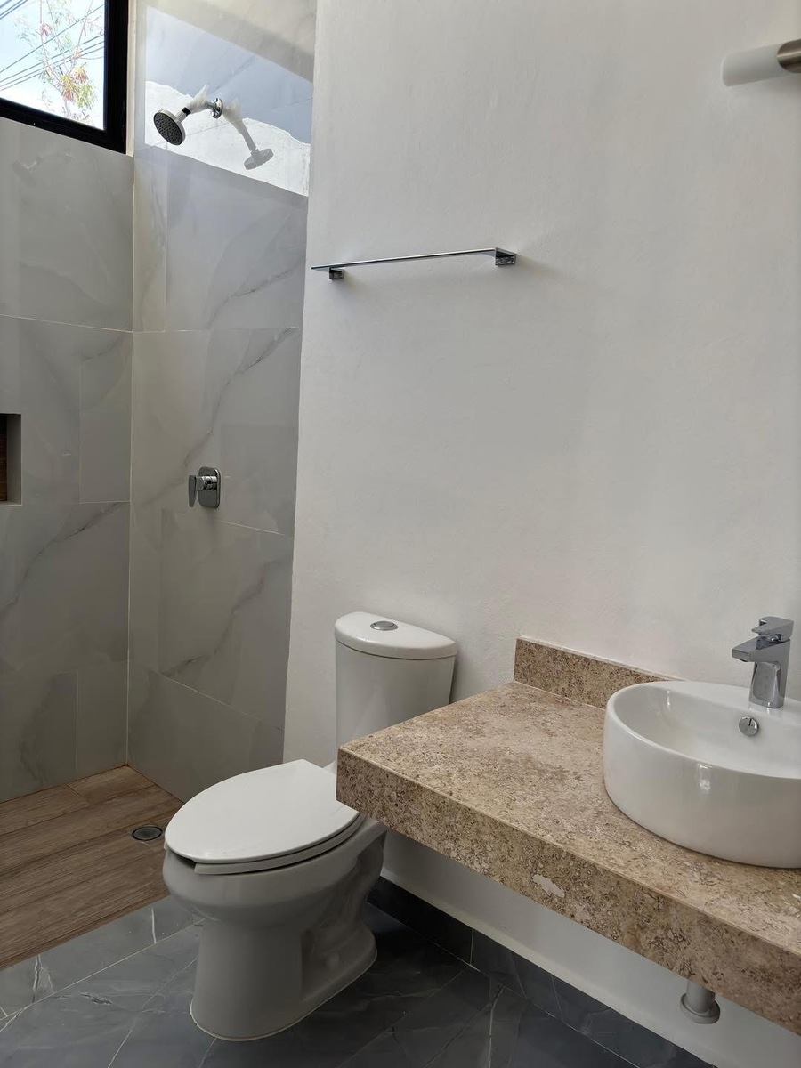 12 de 15: Baño Compartido