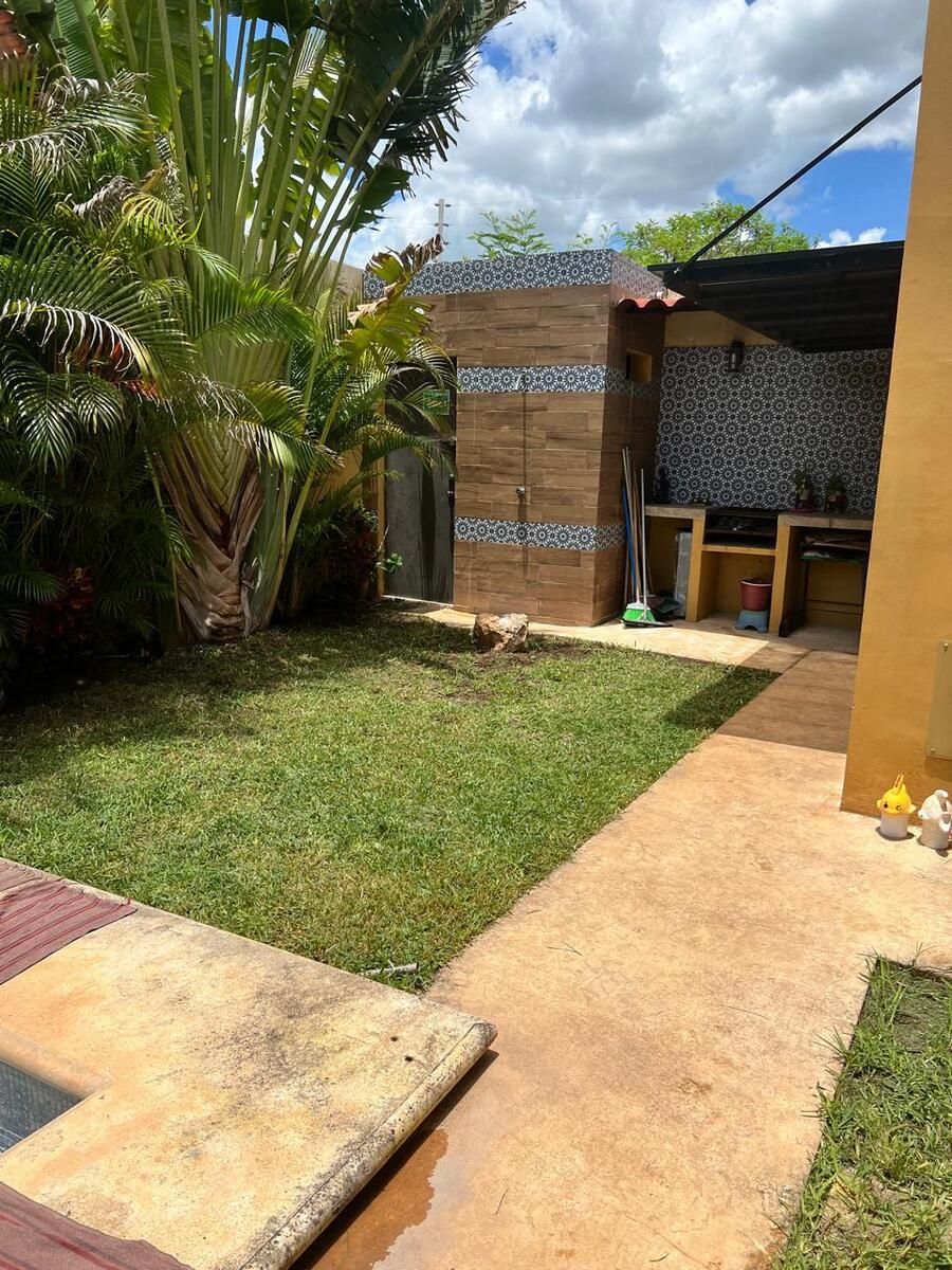 22 de 35: Área de asadores y Baños