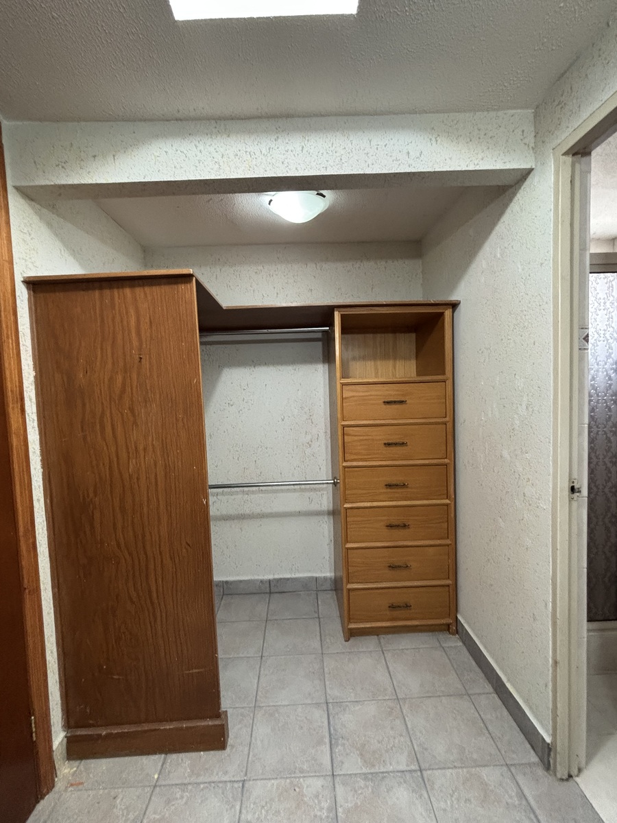 8 of 14: Walk-in closet