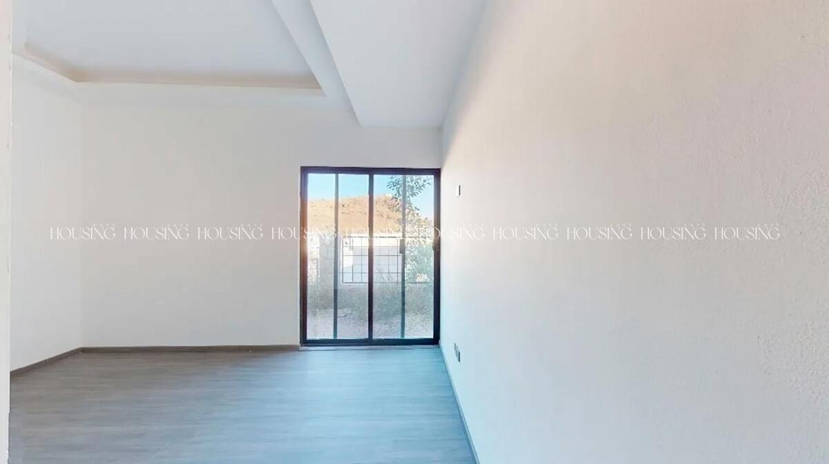 7 de 13: Recámara Planta baja con vestidor  y Baño