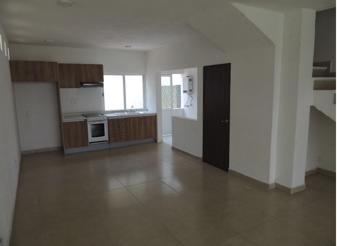 12 de 14: SALA COMEDOR Y MEDIO BAÑO ADJUNTO AREA DE LAVADO.