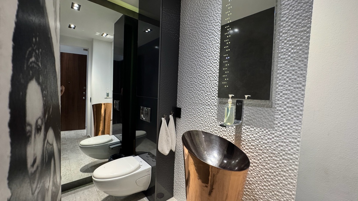 13 of 23: BAÑO VISITAS