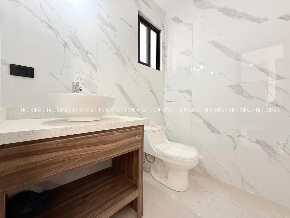 4 de 24: Medio Baño