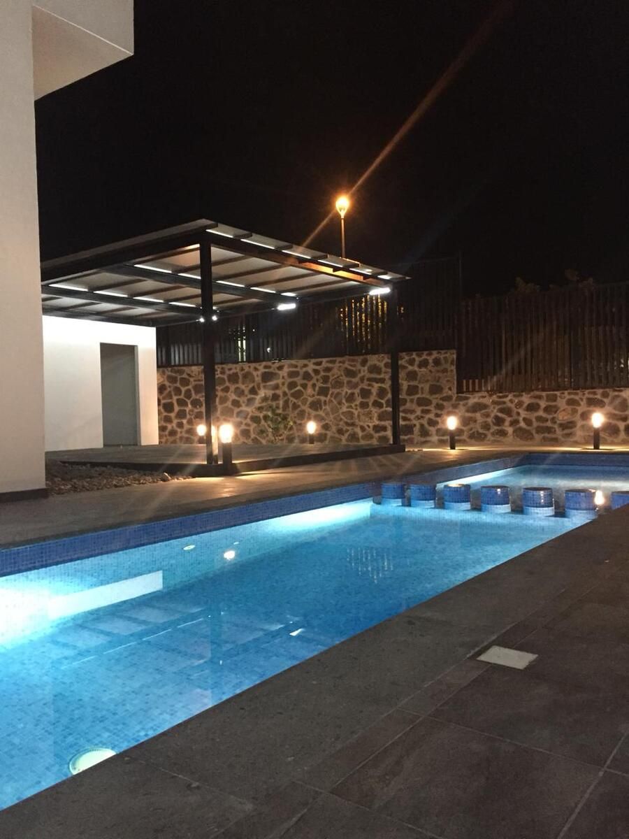 11 de 14: Alberca y área de usos múltiples