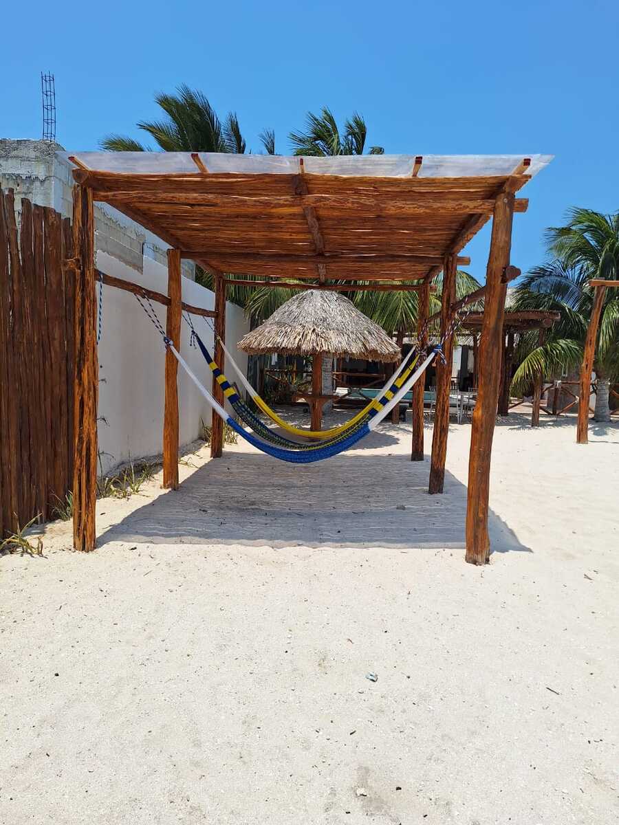 4 of 43: Palapa con hamacas