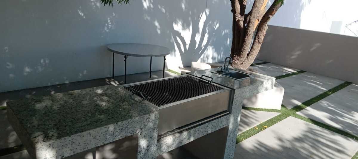 30 de 41: Asador Casa Club.