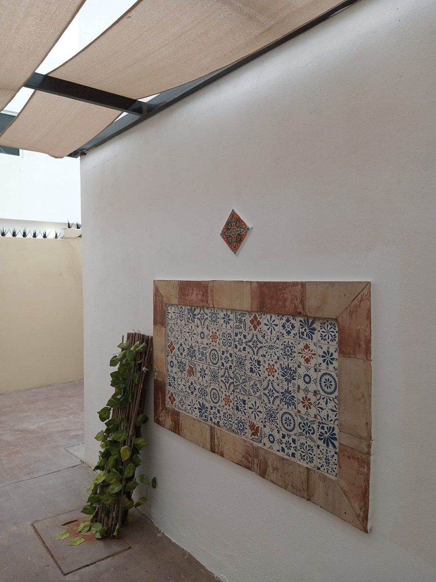 27 de 41: Área de asador con protección en pared