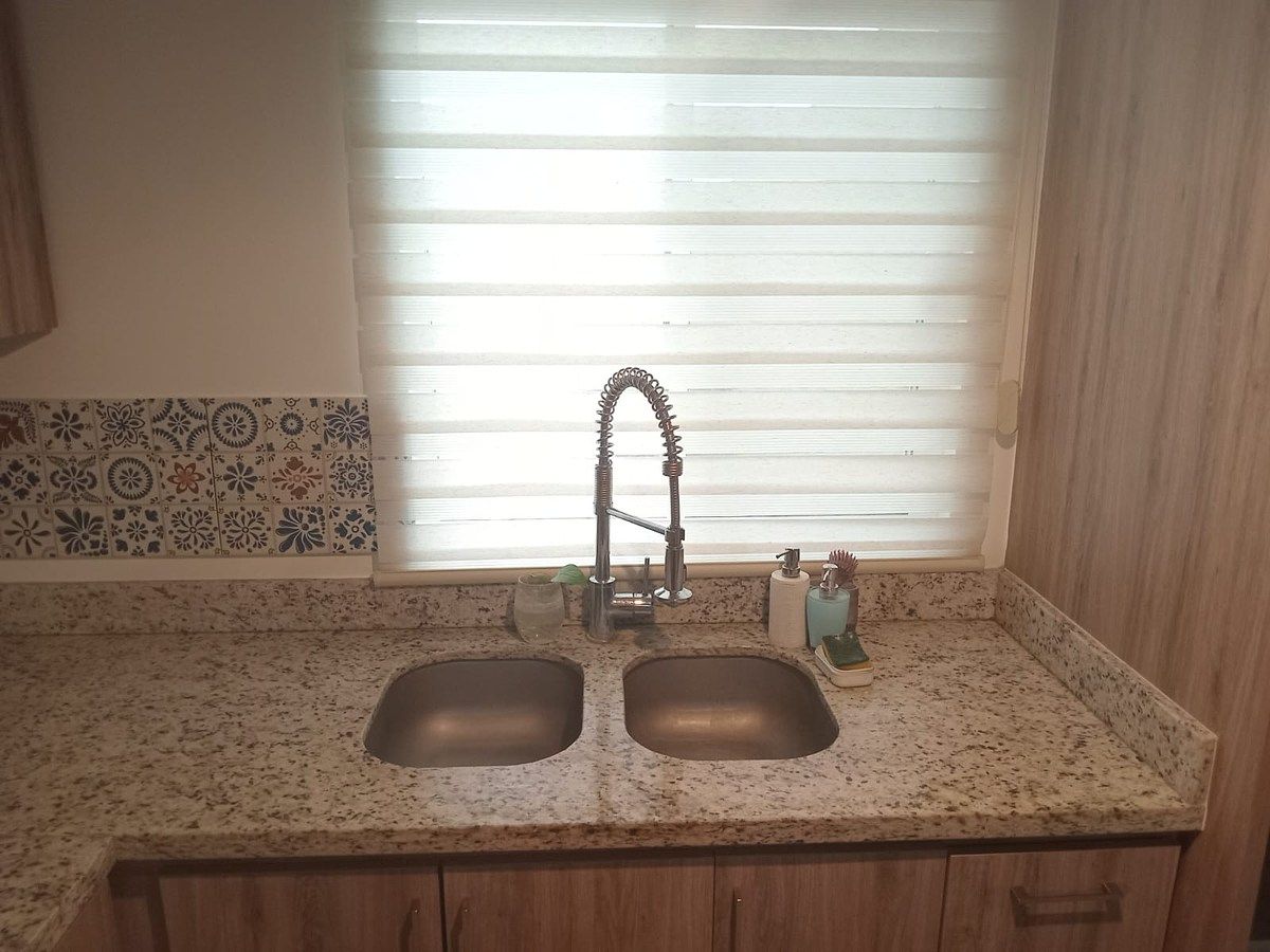 10 de 41: Área de Lavatrastos