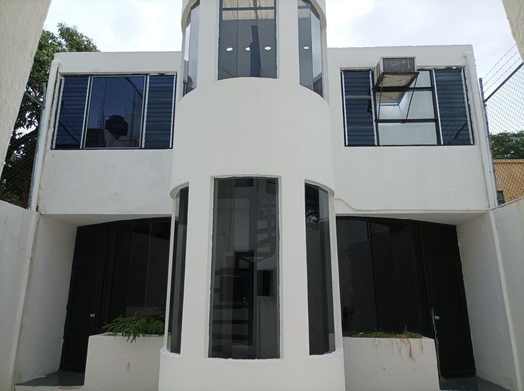 1 de 17: FACHADA POSTERIOR