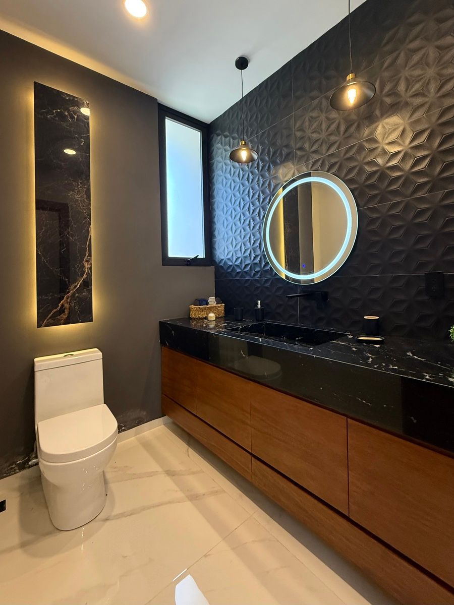 41 de 42: Medio baño de visitas