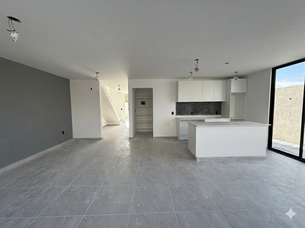 4 of 37: Espacio abierto de sala, comedor y cocina.