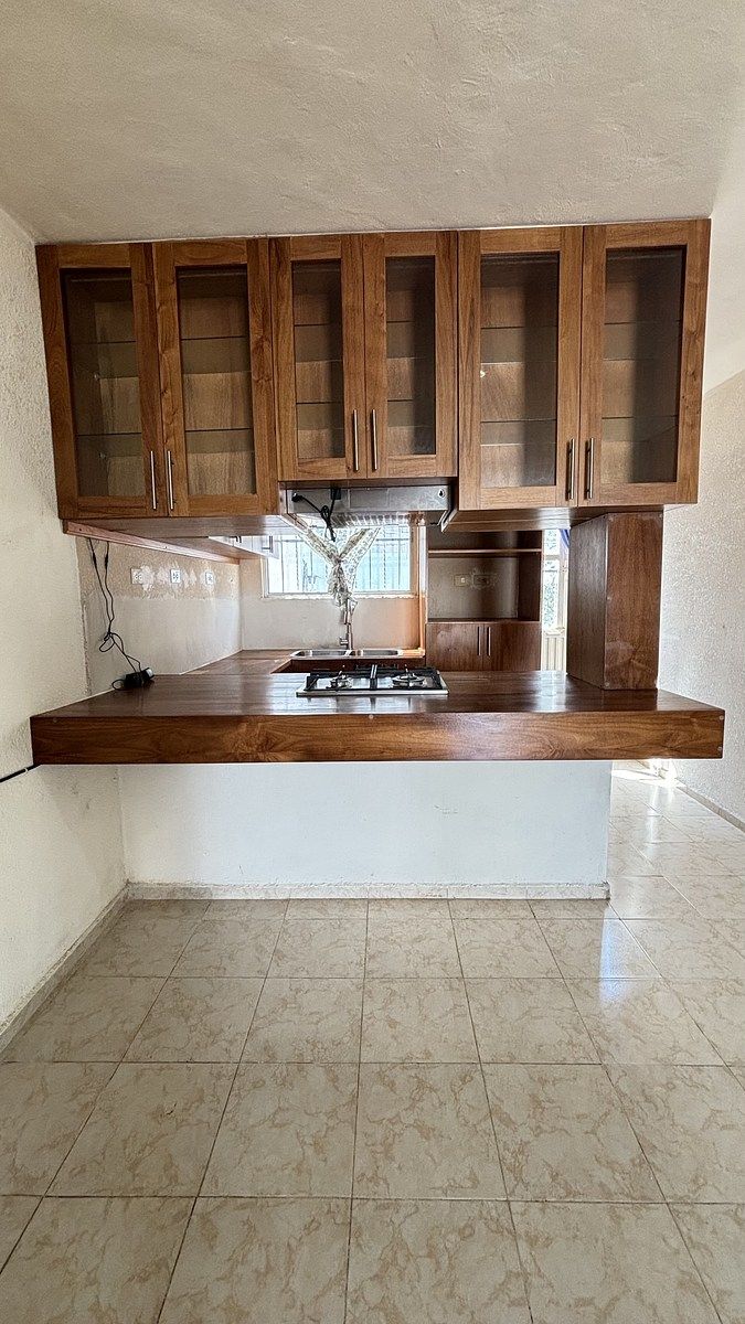 16 de 28: vista de la cocina desde el comedor