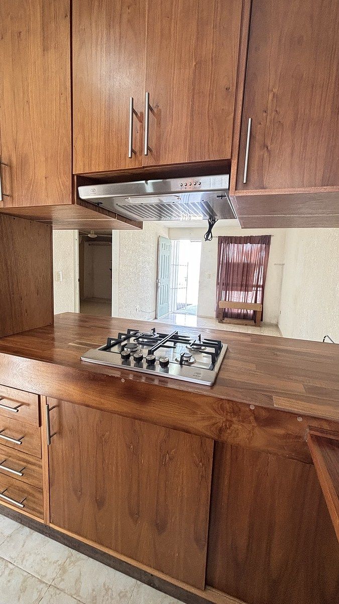 14 de 28: cocina con vista al comedor