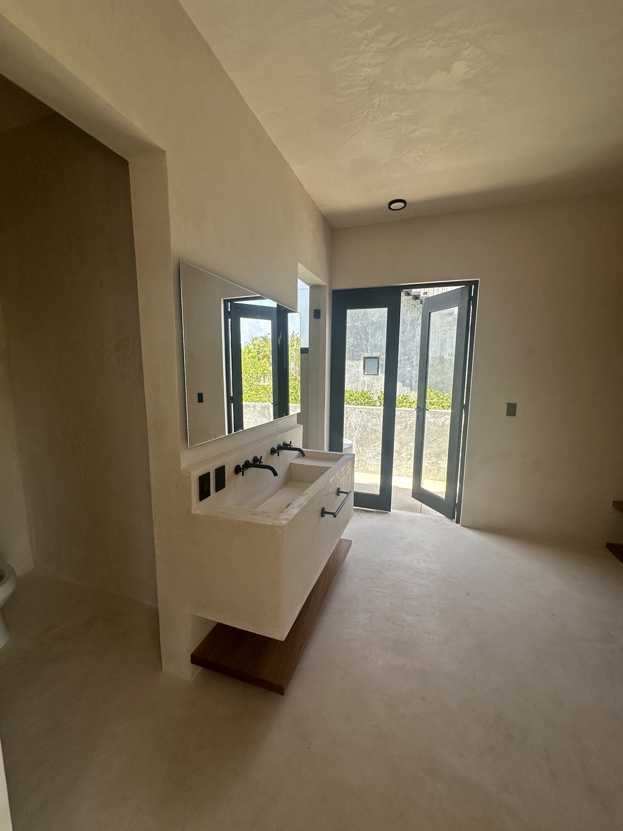 30 of 35: Primary en suite with dressing room and double shower heads