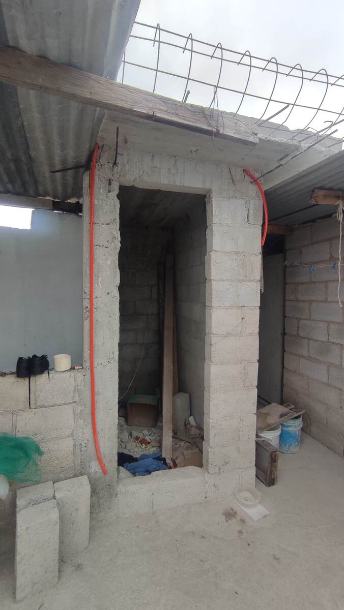 9 de 13: Baño en obra negra