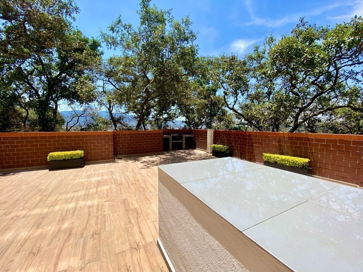 23 de 30: Terraza del edificio con zona de BBQ