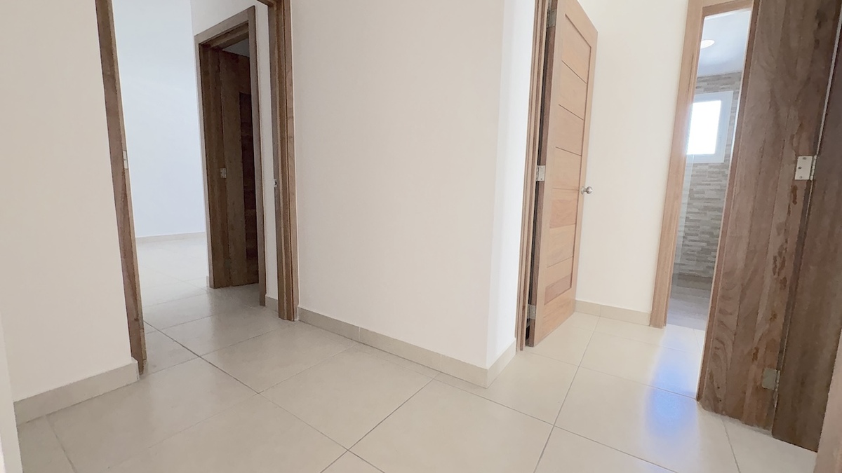 10 de 26: Area de circulación entra las habitaciones