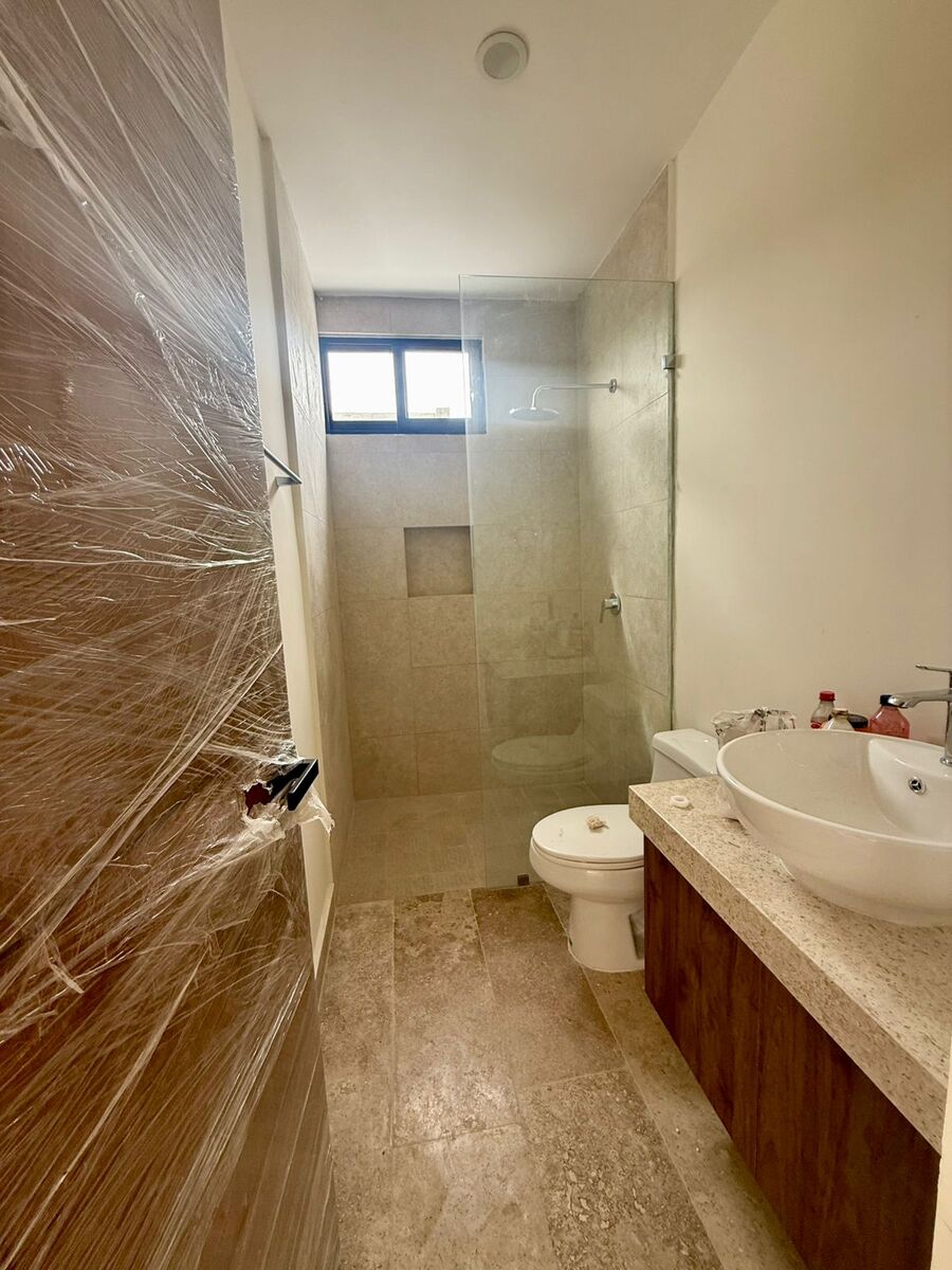 5 de 11: Baño Compartido