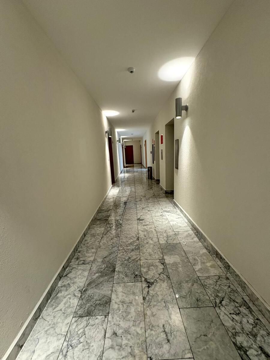 18 de 36: HALL DEL PISO DEL DEPARTAMENTO