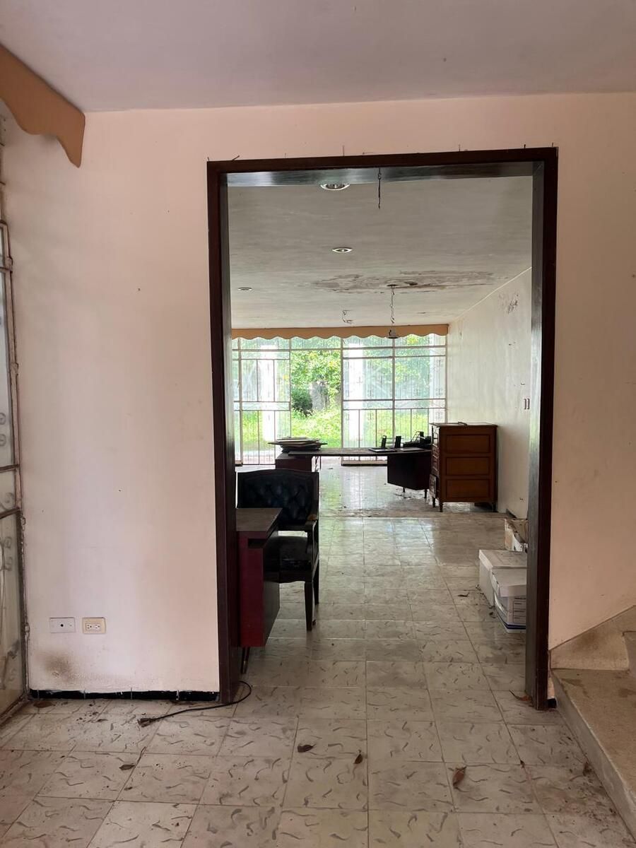 15 de 26: Un gran acceso a la sala comedor.