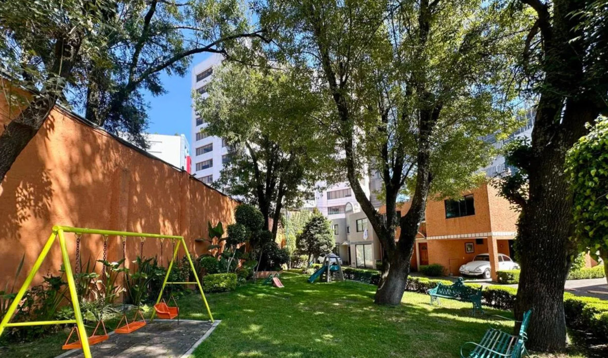 32 de 32: Jardín común