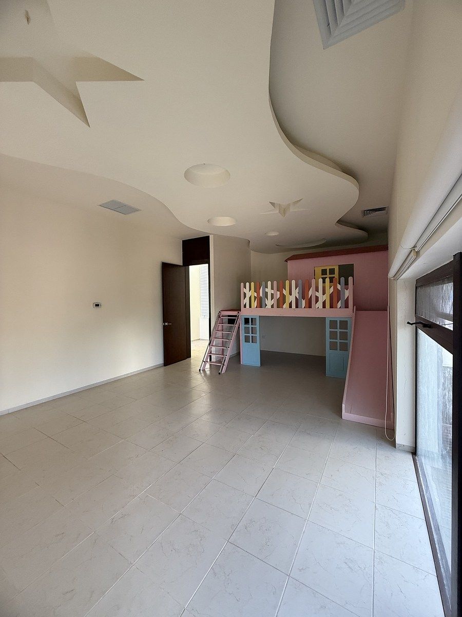 31 de 51: Cuarto de juegos