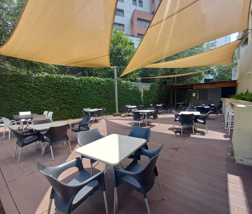 16 de 19: Jardín - restaurante común