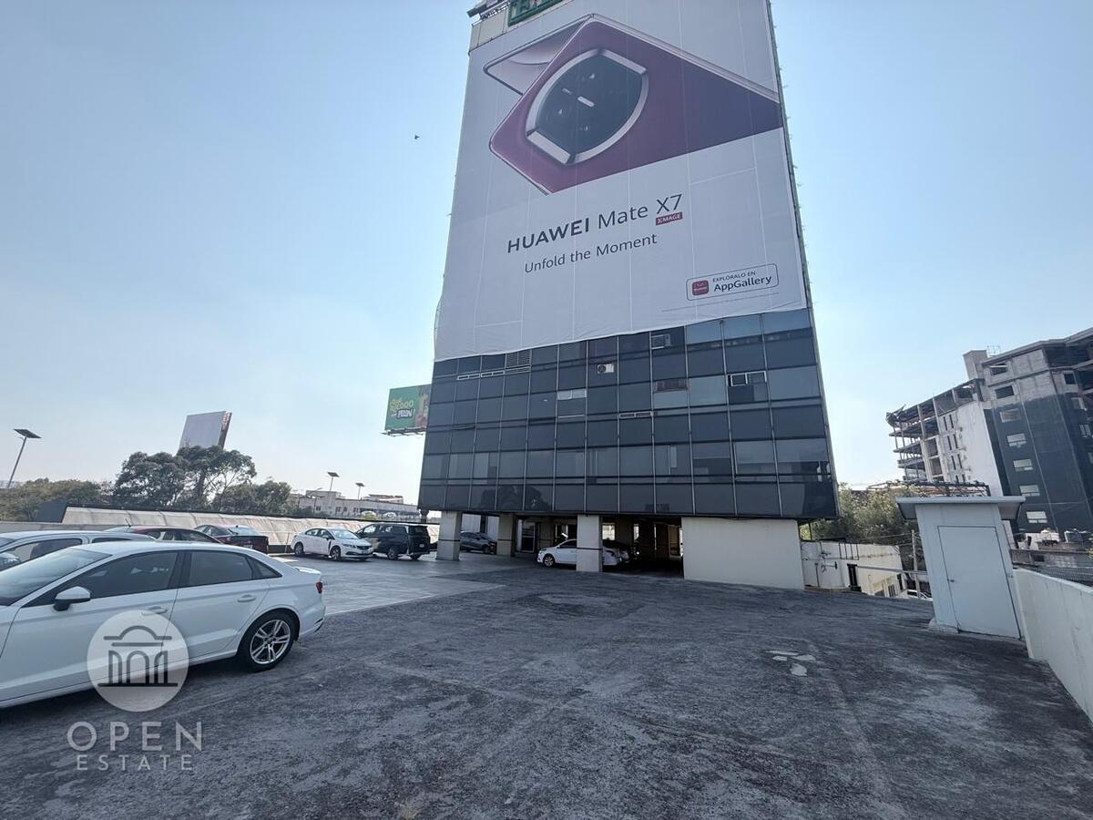 22 de 26: Rampa de Acceso por la calle tracera