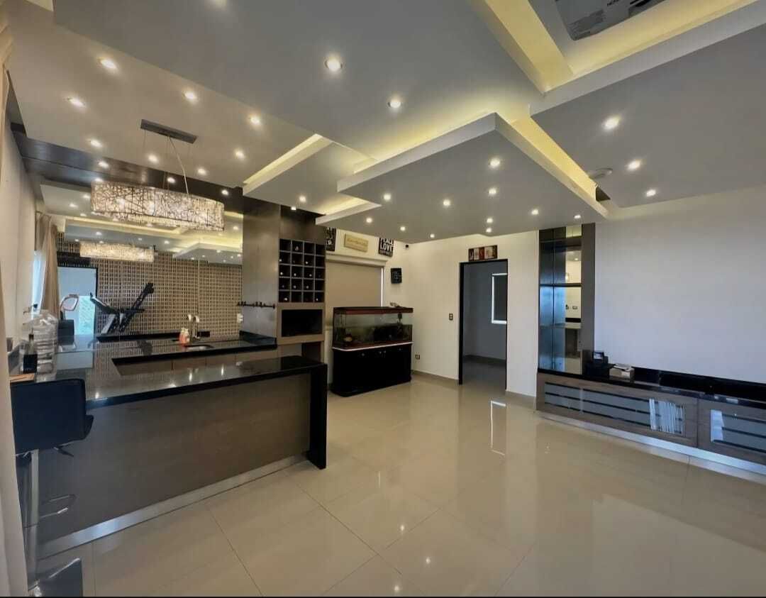 29 de 33: 3er Planta, Área social con bar y proyector