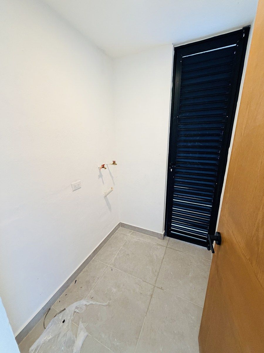 23 de 32: Área de lavado techada