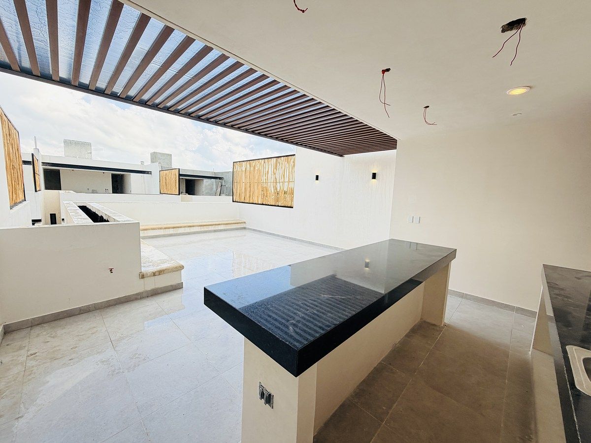 25 de 32: Roof top con meseta de granito