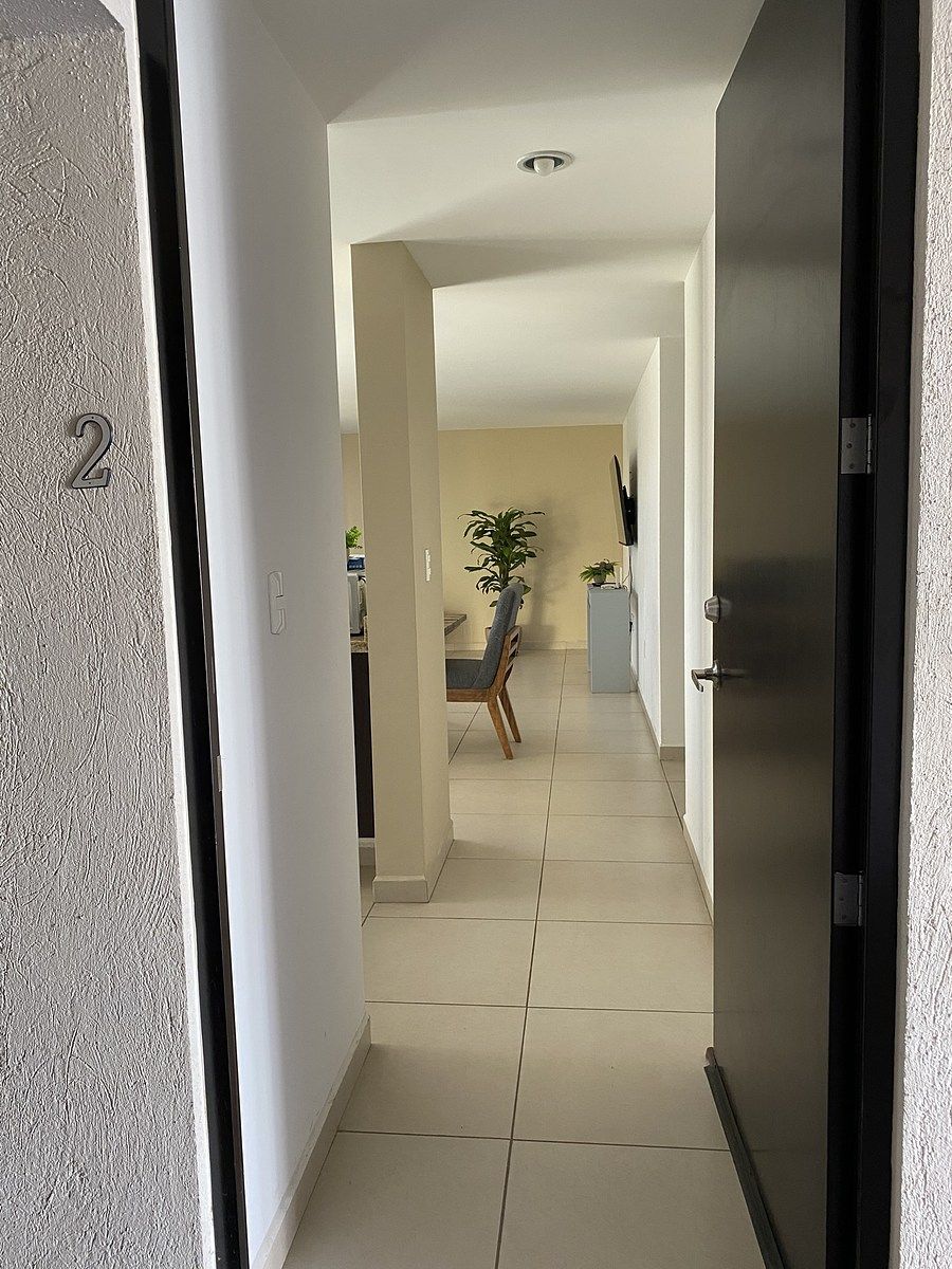 3 de 28: Entrada al departamento en PB