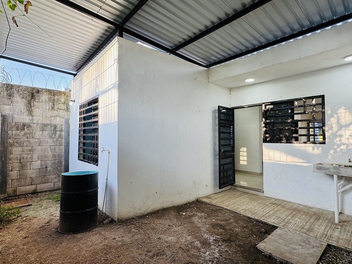 10 de 15: Patio trasero techado y protegido