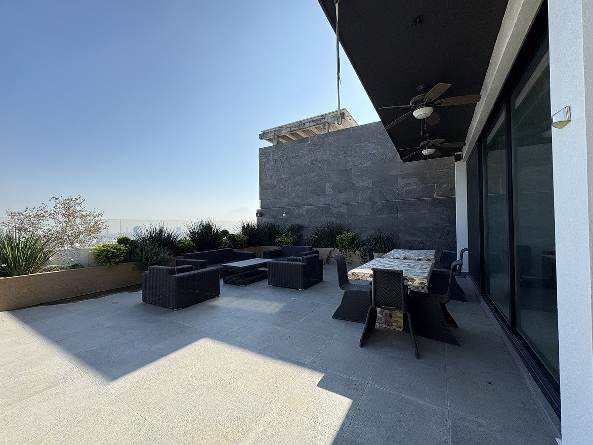 40 de 42: Sala y comedor de exterior