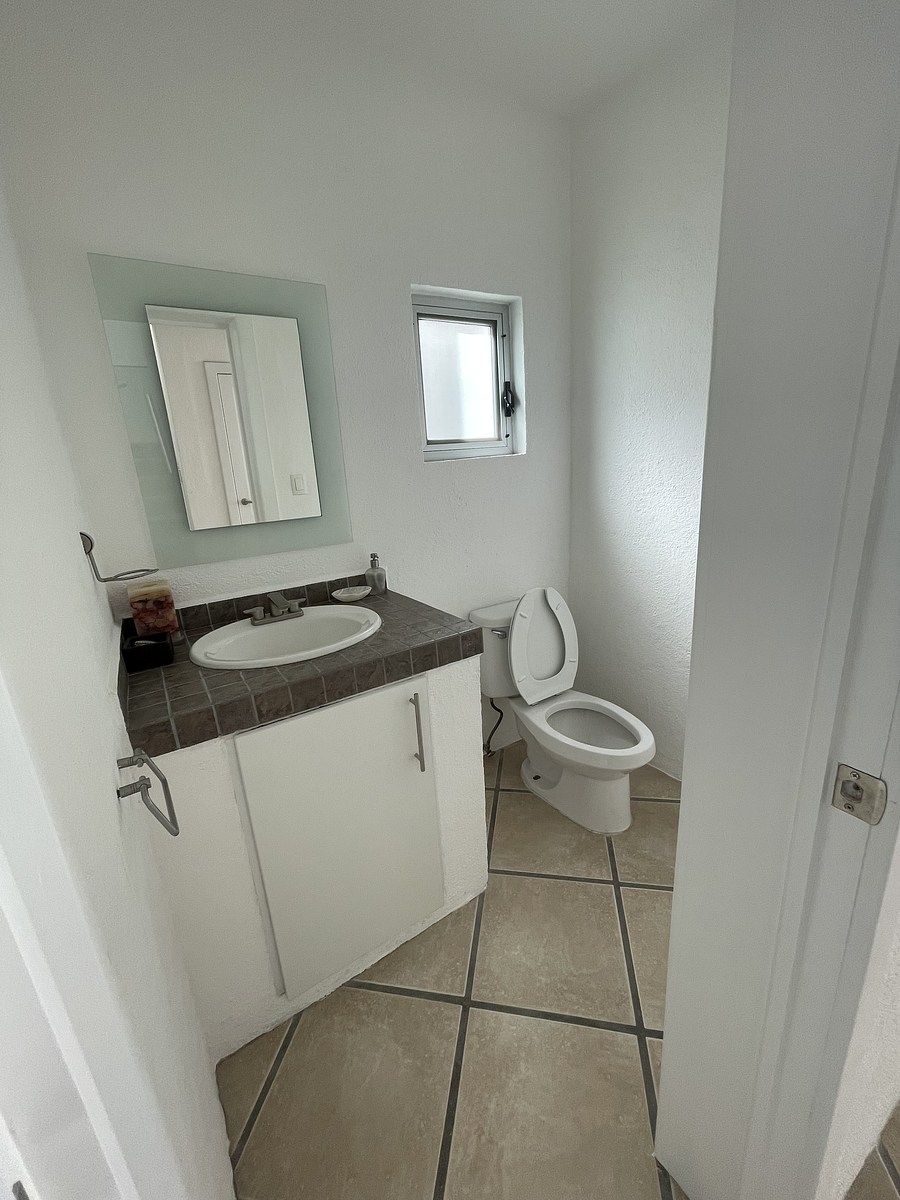 27 de 34: baño compartido