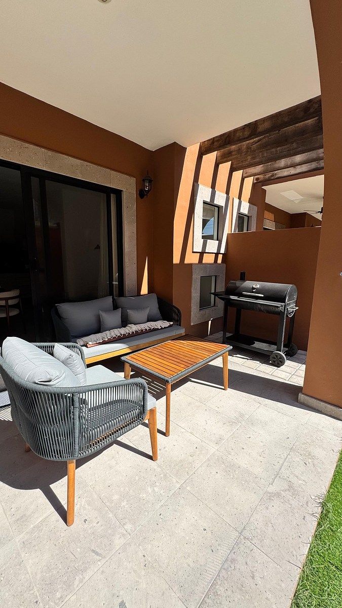 8 de 21: Sala en terraza con asador