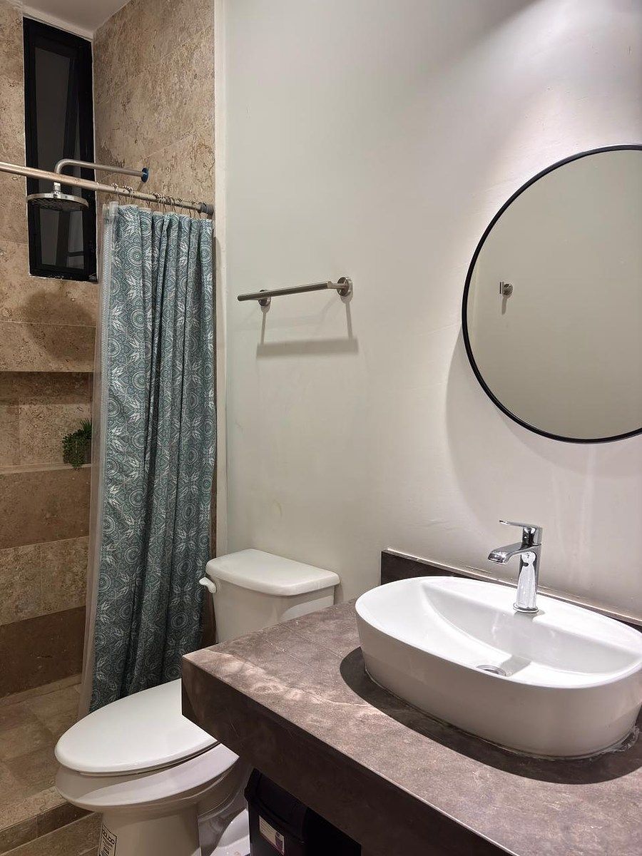 6 de 9: Baño Compartido