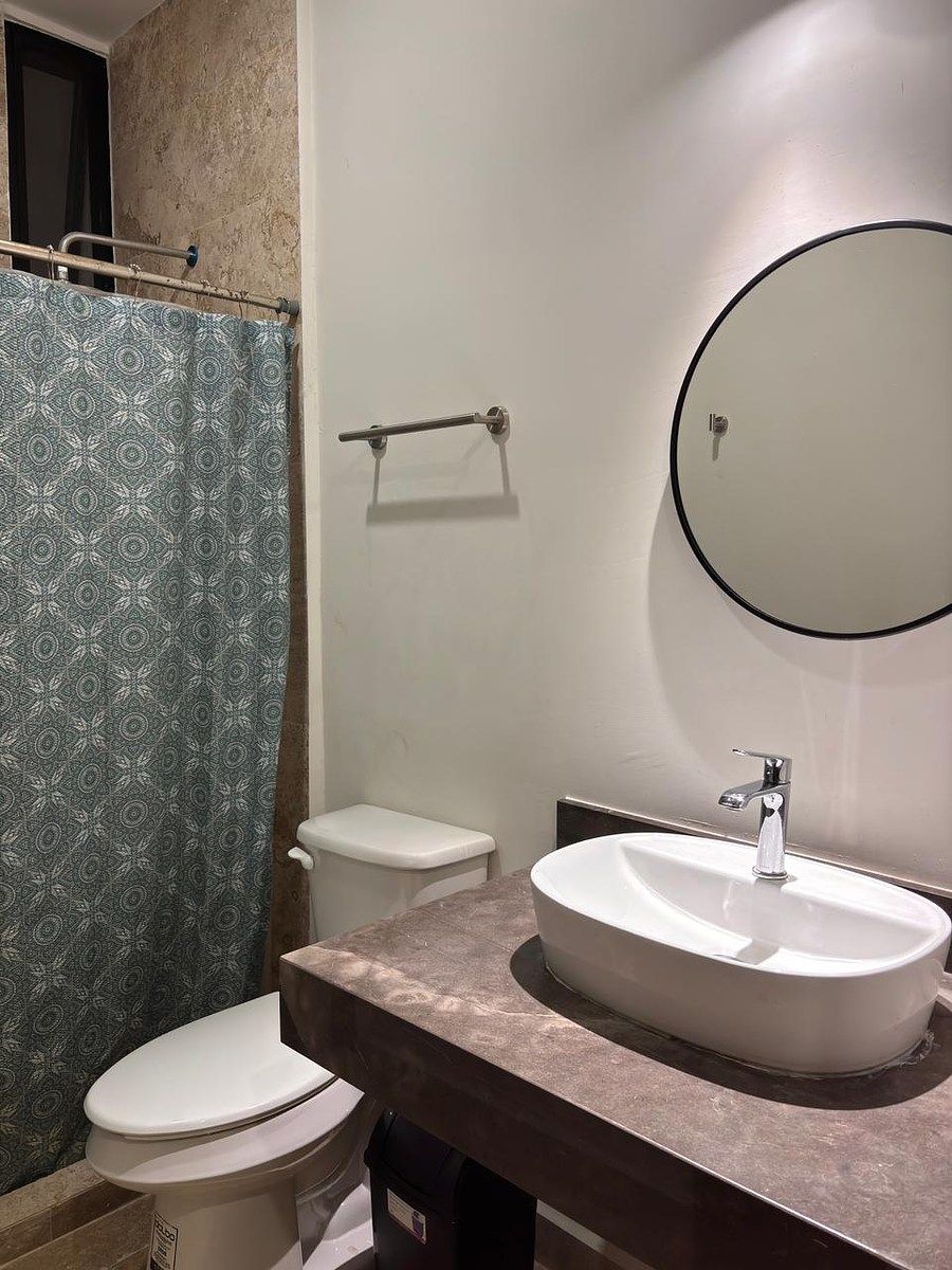 7 de 9: Baño Compartido