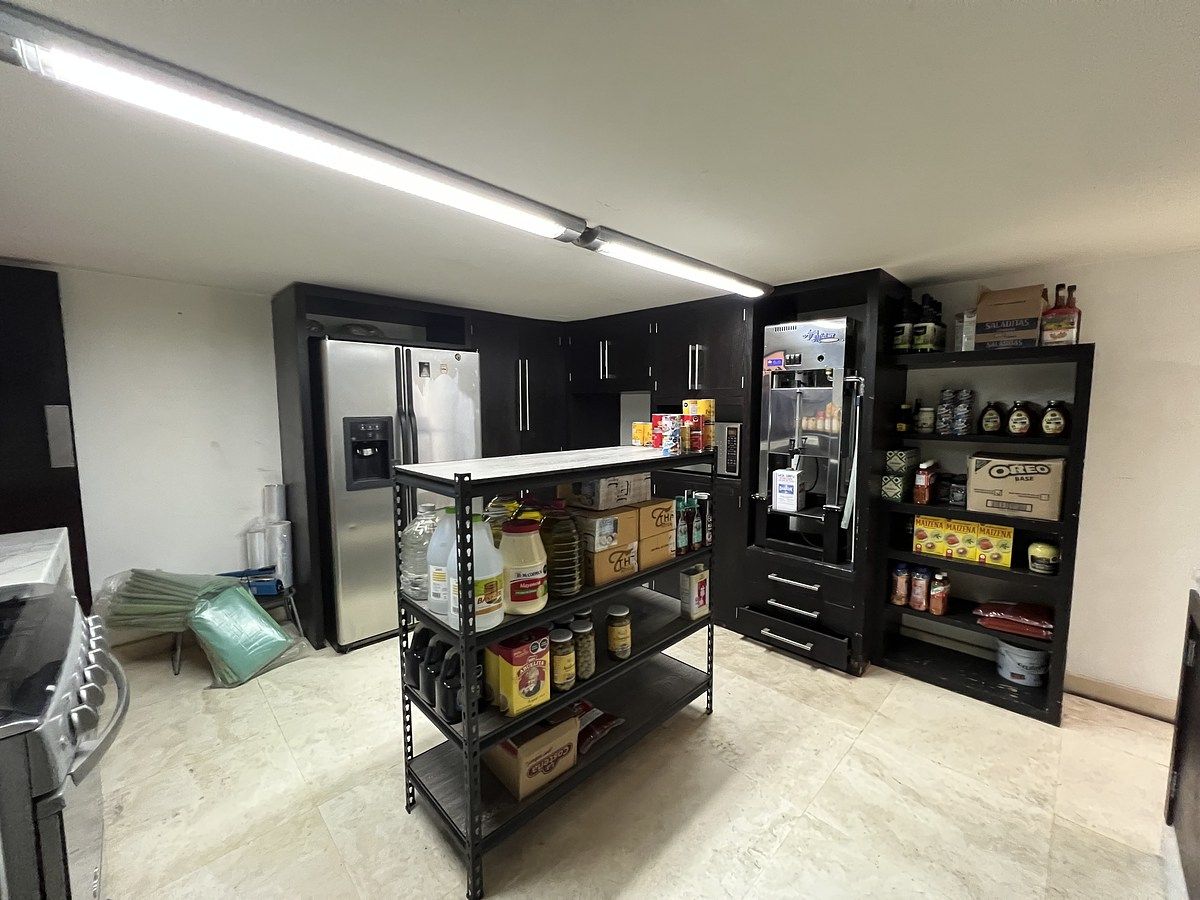 11 de 39: Cocina exclusiva para salón de juegos