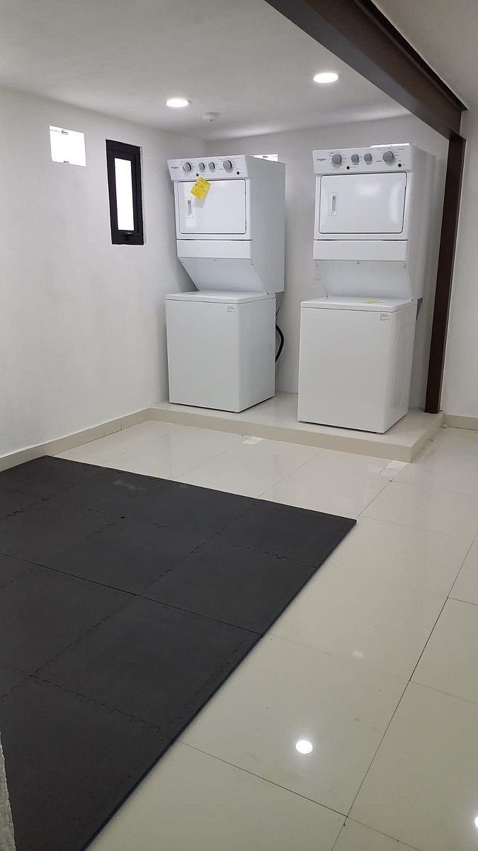 18 de 20: ÁREA DE LAVADO Y ESPACIO PARA YOGA