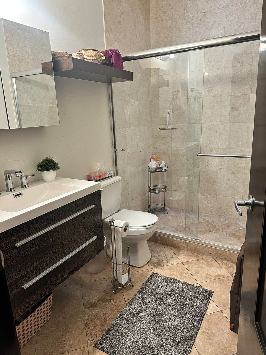 29 de 42: Baño compartido