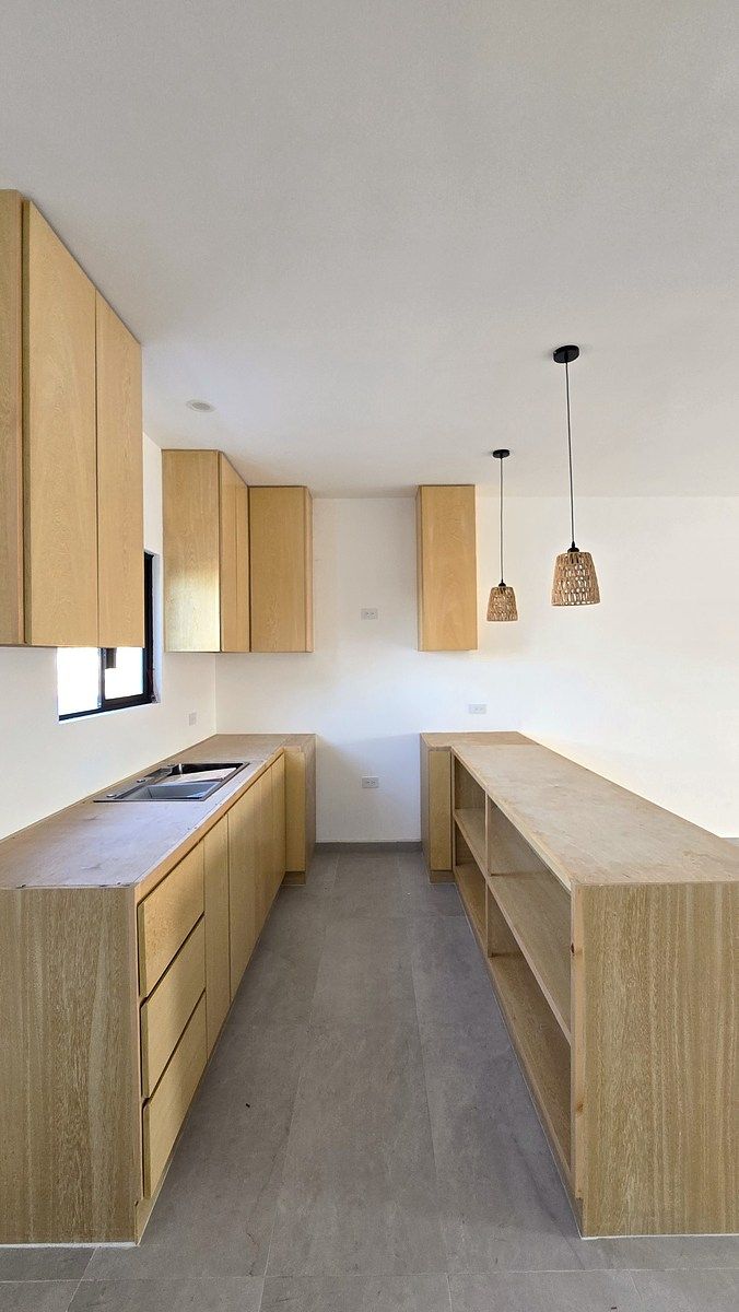 8 of 16: COCINA VISTA LATERAL. GRANITO PENDIENTE DE INSTALAR