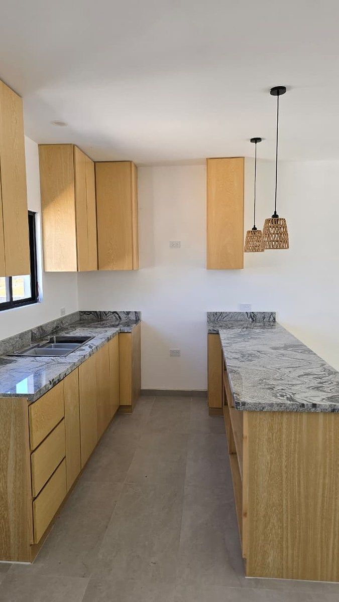 8 de 16: COCINA AREA DE ESTUFA Y CAMPANA