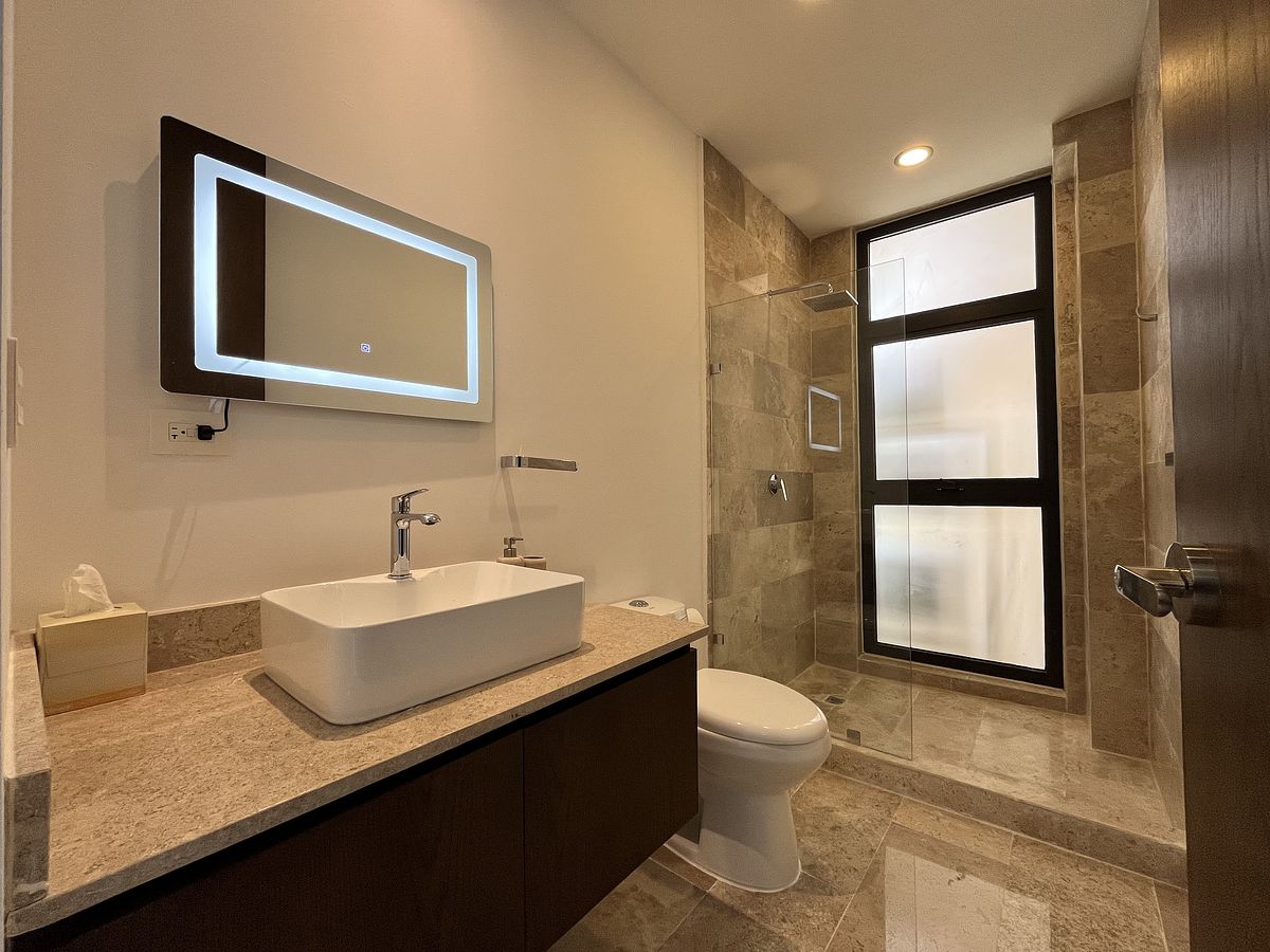 16 de 45: Baño compartido